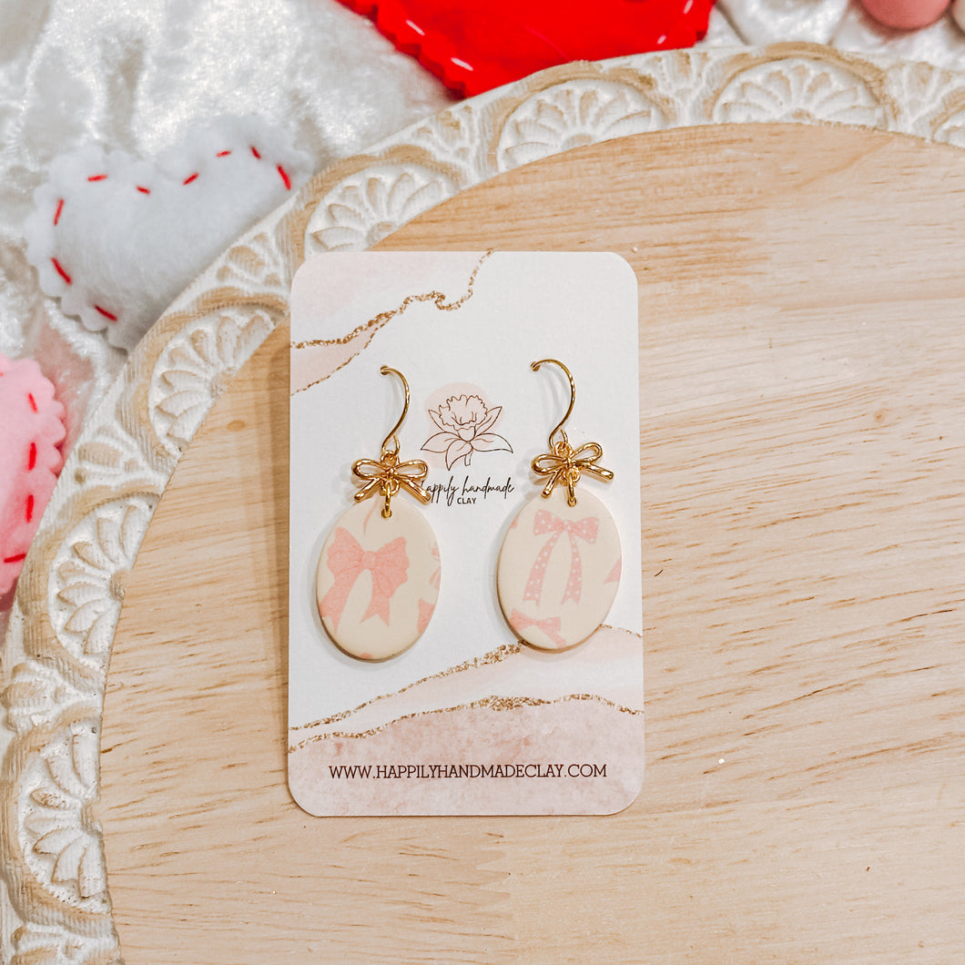 Cream Bow Oval Dangles