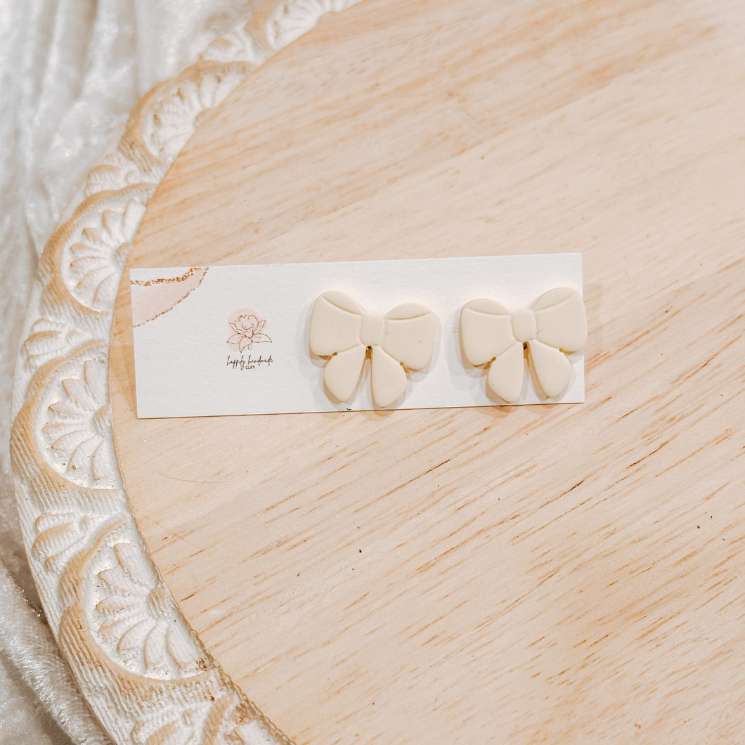 Cream Bow Studs